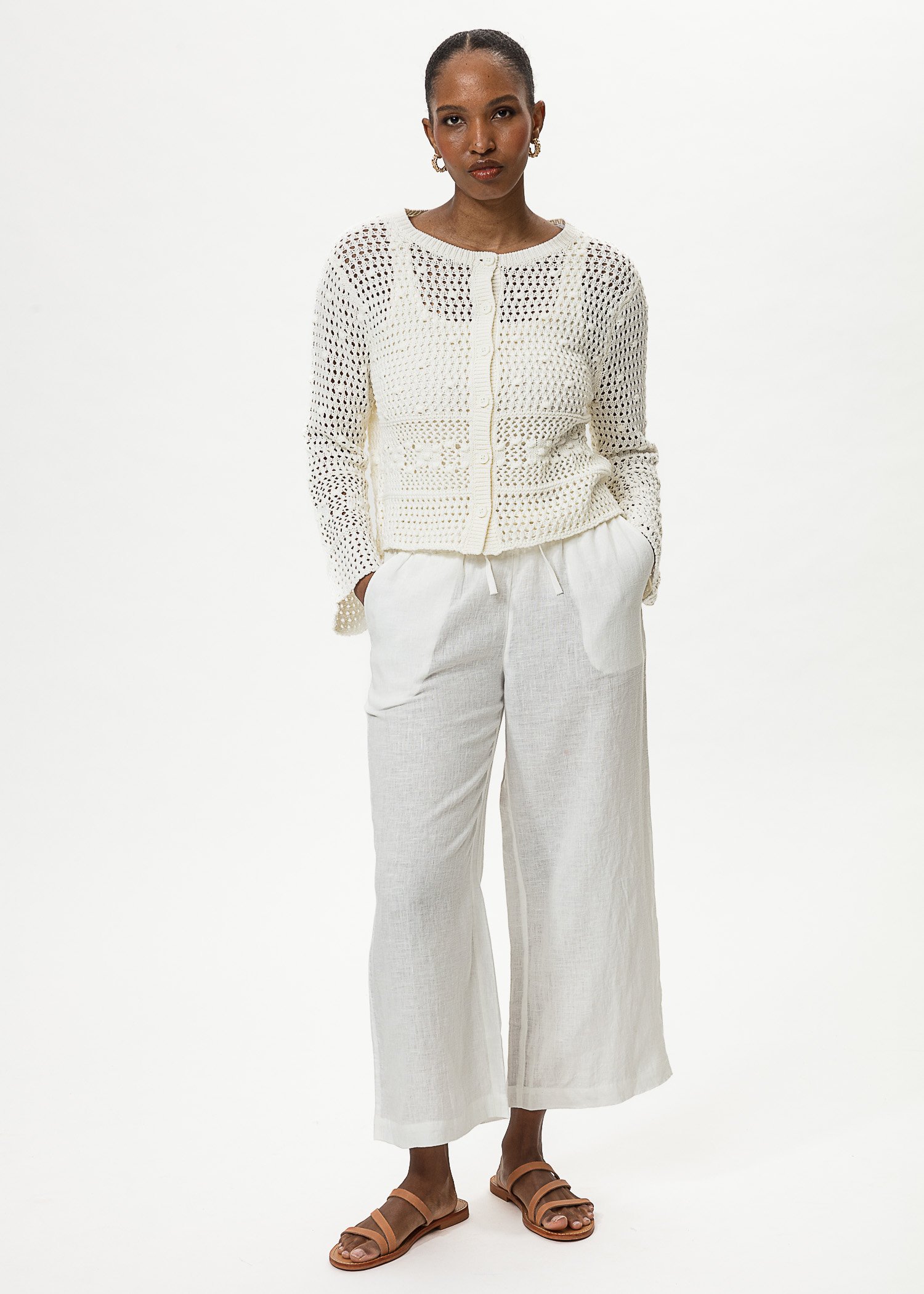 White cropped linen trousers