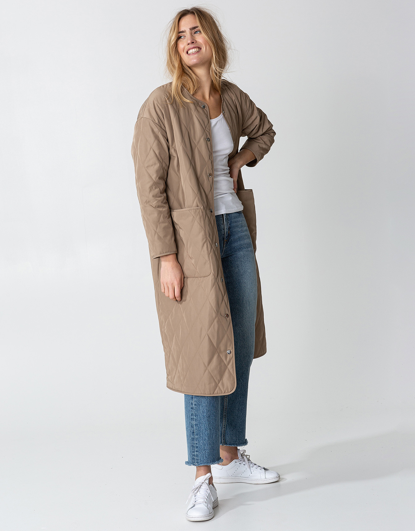 Beige long quilted coat Image 0