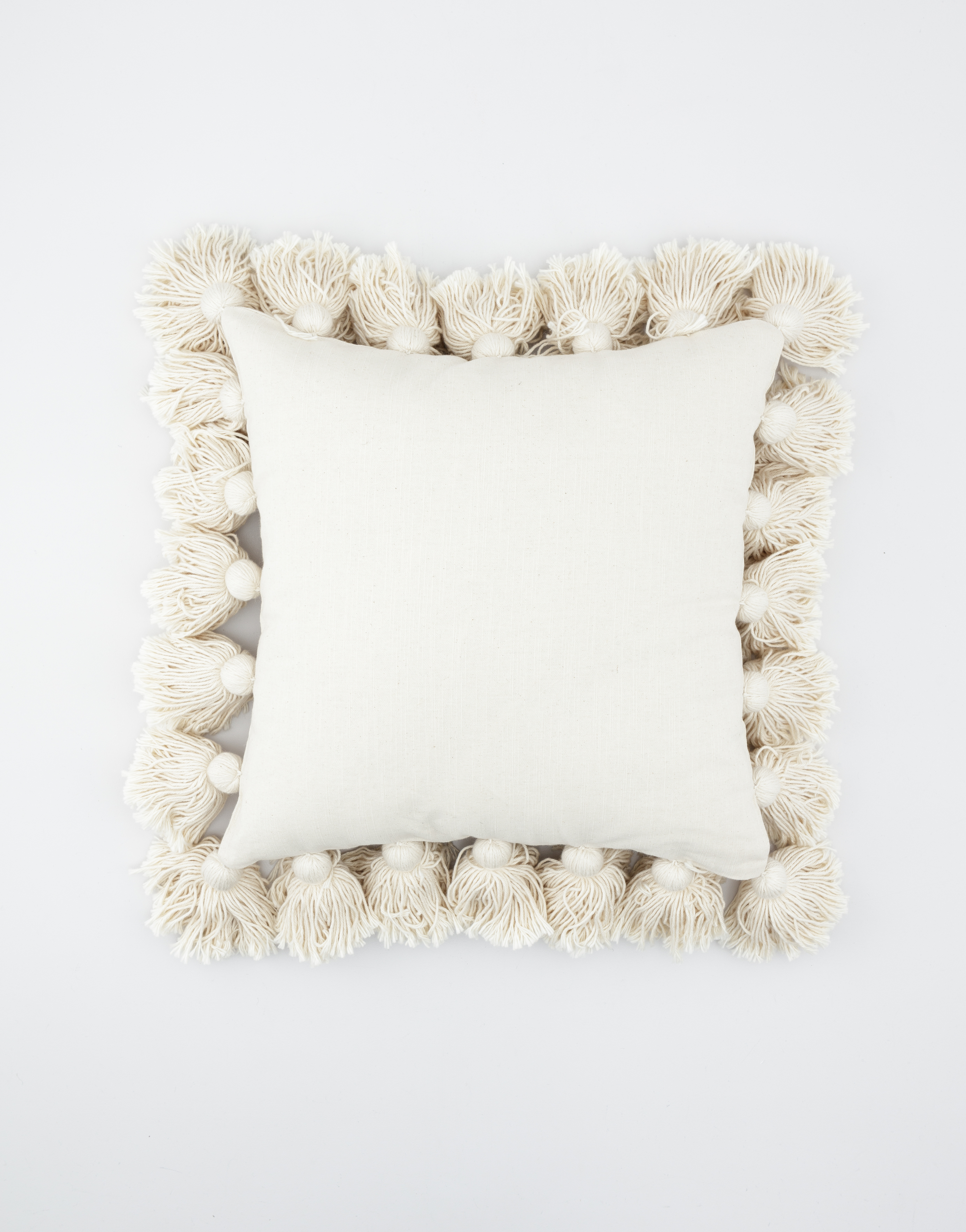 White cotton cushion with tassels thumbnail 0
