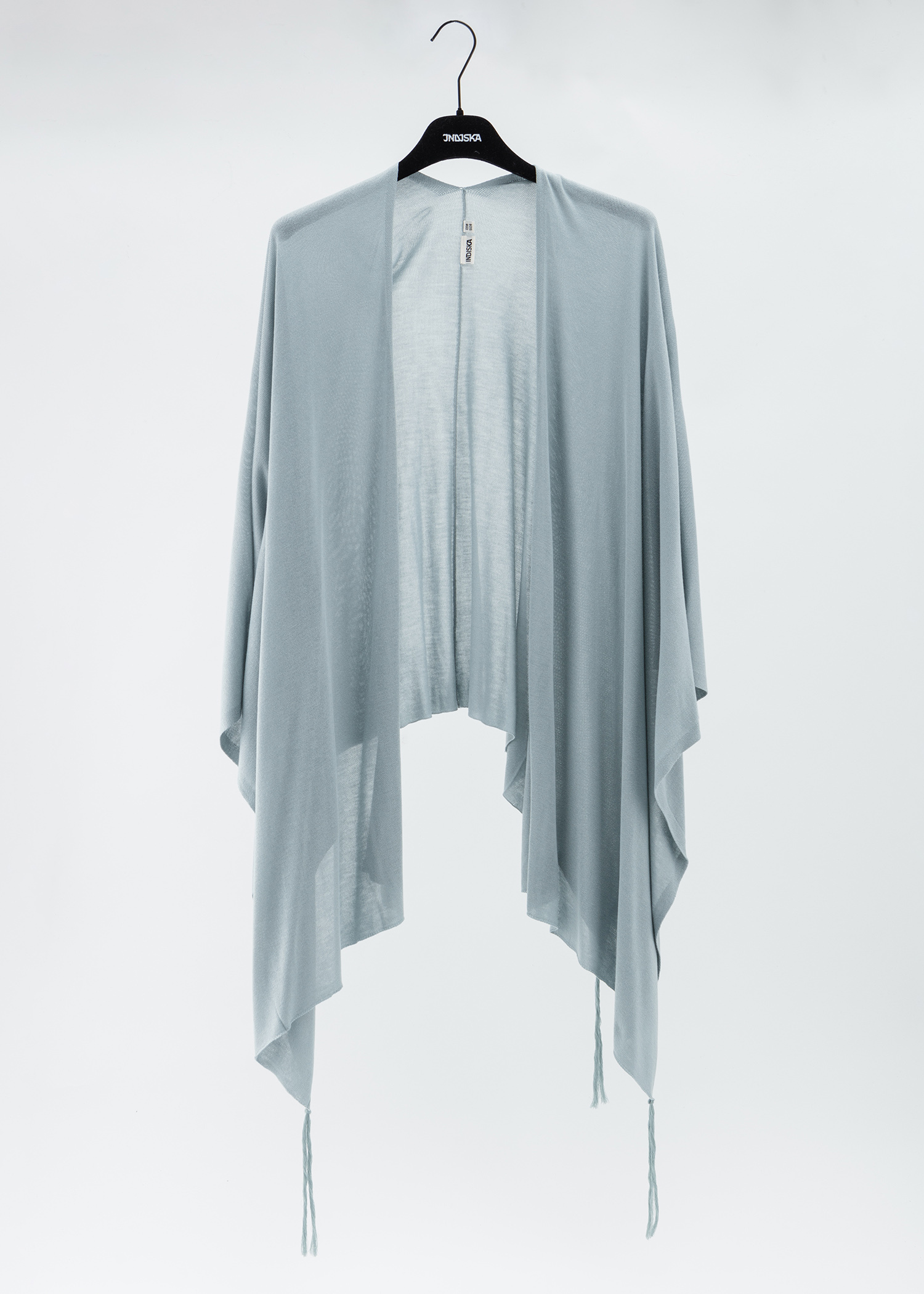 Poncho with tassles